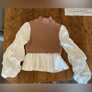 Anthropologie women’s blouse. So cute. Worn once